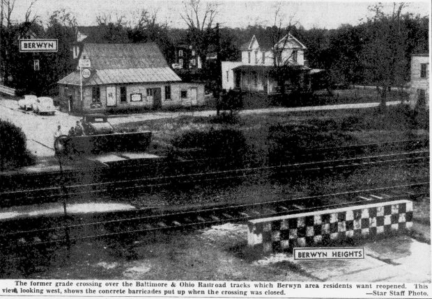 Berwyn, Berwyn Hts railroad crossing photo lite, EvSt 12-10-1951 pB1
